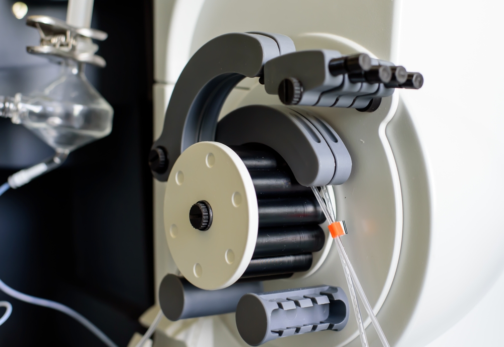 image_Peristaltic,Pump,With,Plastic,Tubes,And,Rollers,Moving.