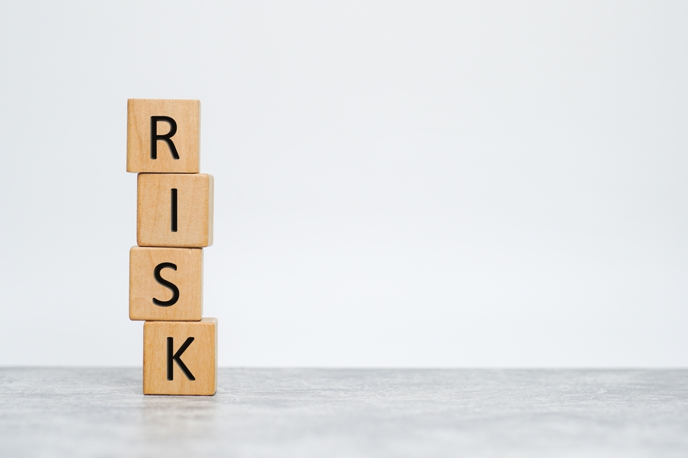 image_Wooden,Cubes,With,The,Word,Risk.,Risk,Taking,,Risk,Management
