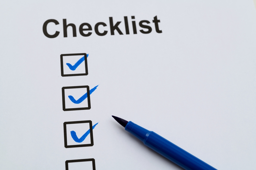 image_Blue,Pen,Marking,On,Checklist,Sheet