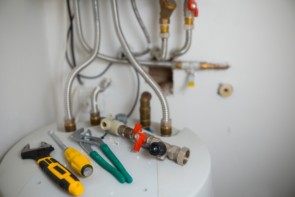 image_Plumbing,Tools,,Including,A,Wrench,And,Pliers,,Rest,On,A