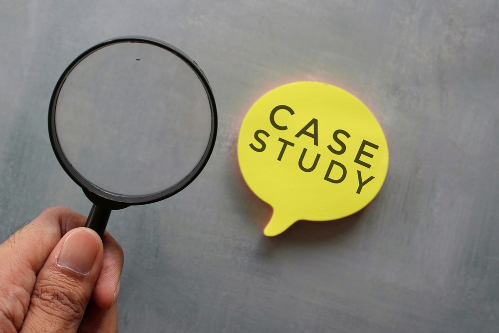 image_Case,Study,Concept.,Hand,Holding,Magnifying,Glass,And,Bubble,Speech