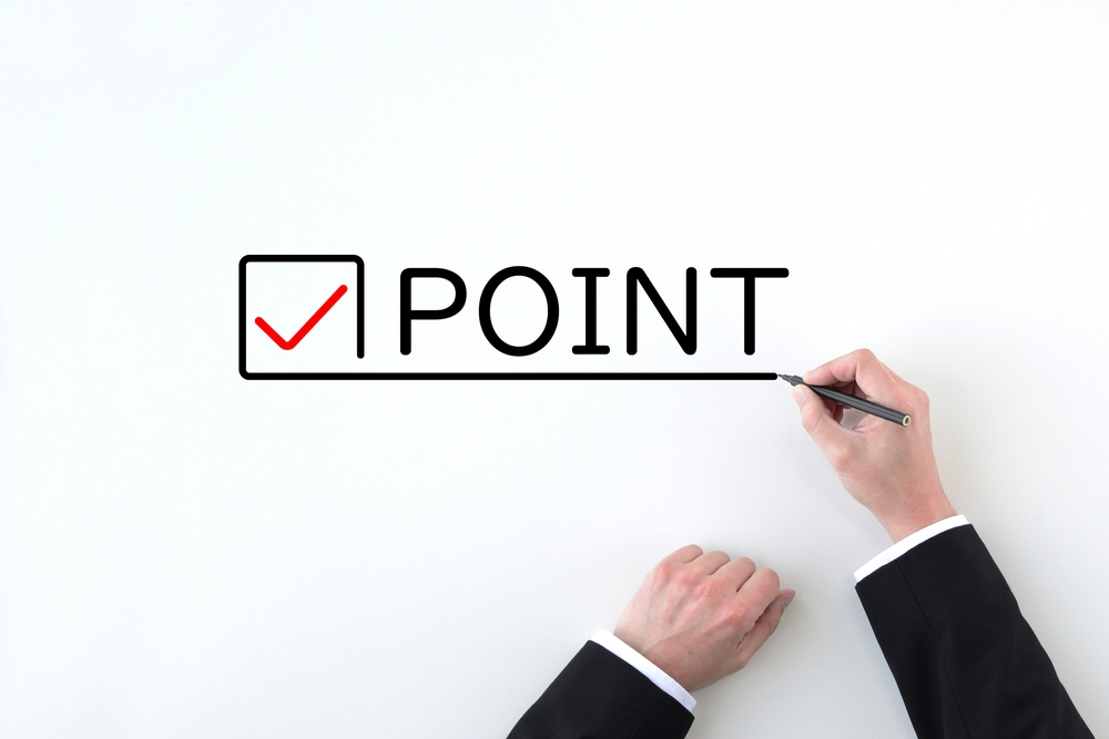 image_Hand,Of,A,Businessman,Drawing,Check,Marks,And,Point,Words