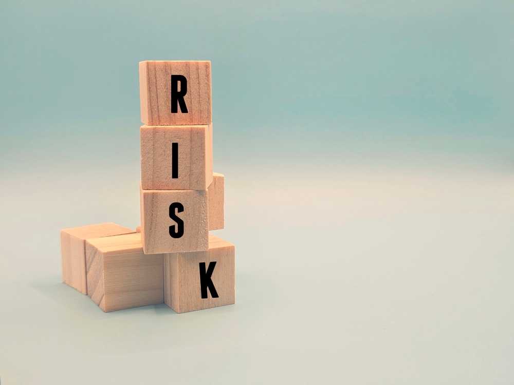 image_Unstable,Wooden,Blocks,Spell,"risk.",This,Represents,Poor,Structure,,Business