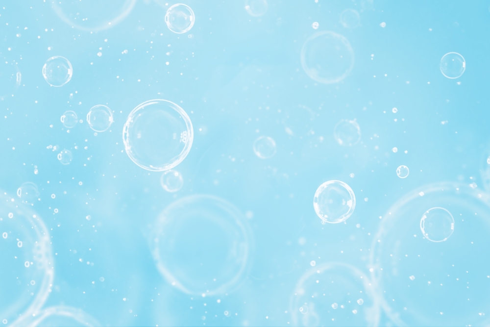 image_Air,Bubbles,Rise,In,The,Clear,,Blue,Water
